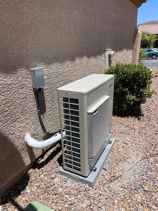 Residential air conditioning condenser unit in Logan